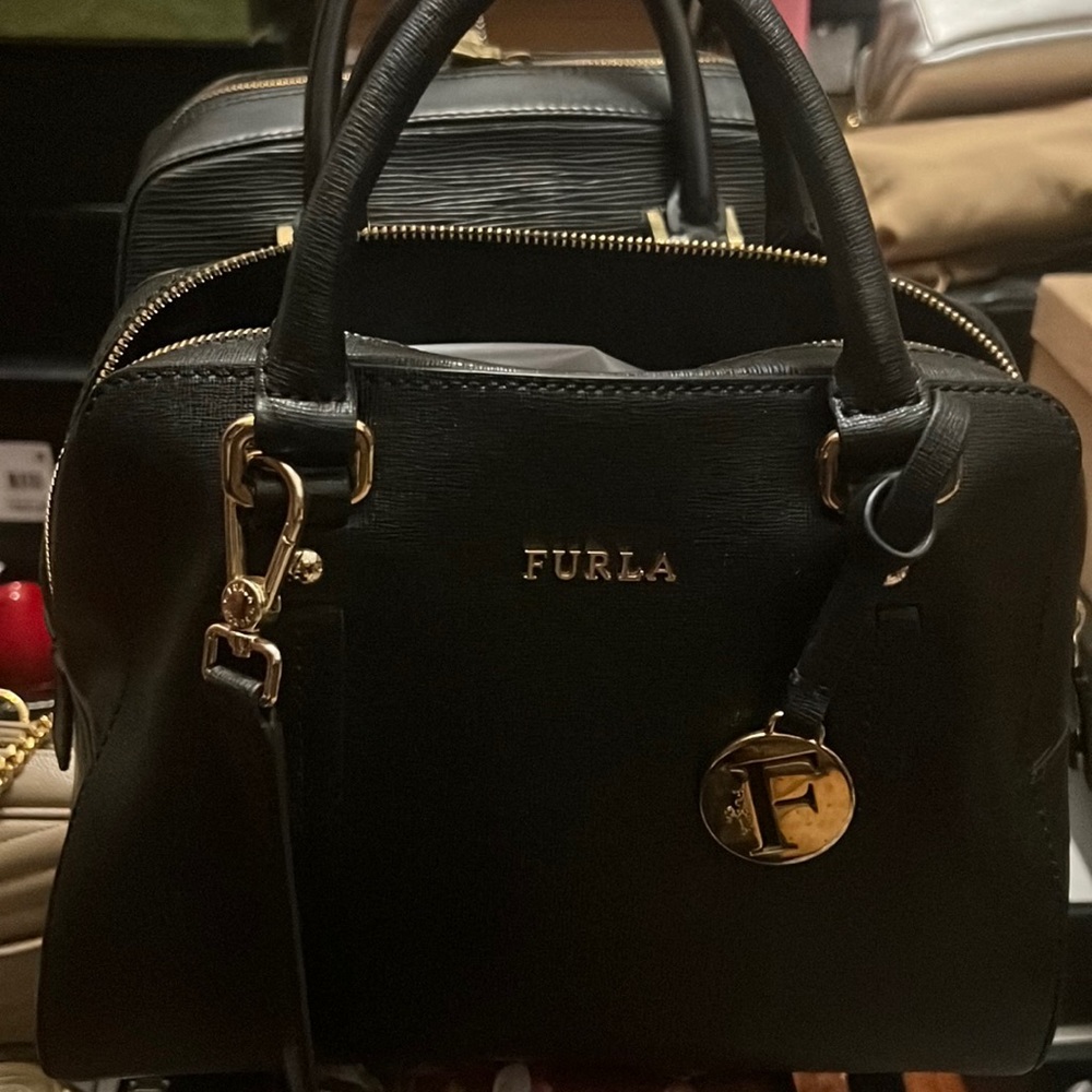 Used furla black small leather top handle bag